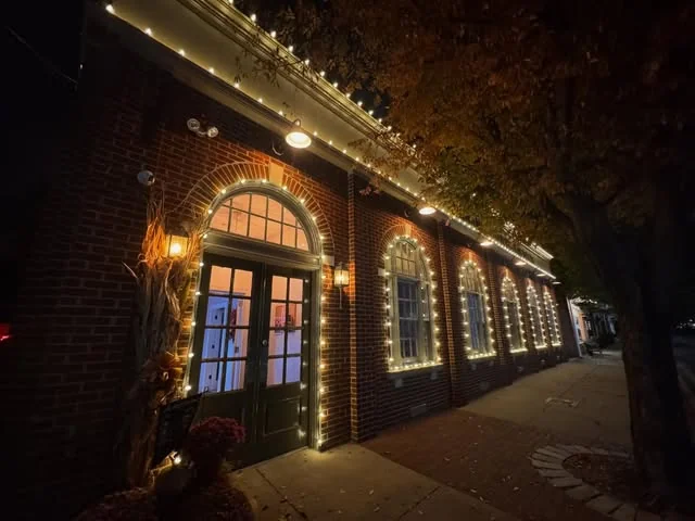 Our new studio building, with its illuminated arched windows and marquee lights